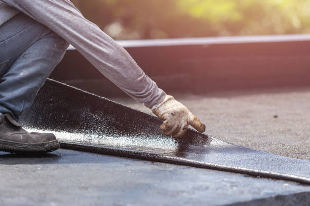 Professional Basement Waterproofing technician working in Millersburg, OH